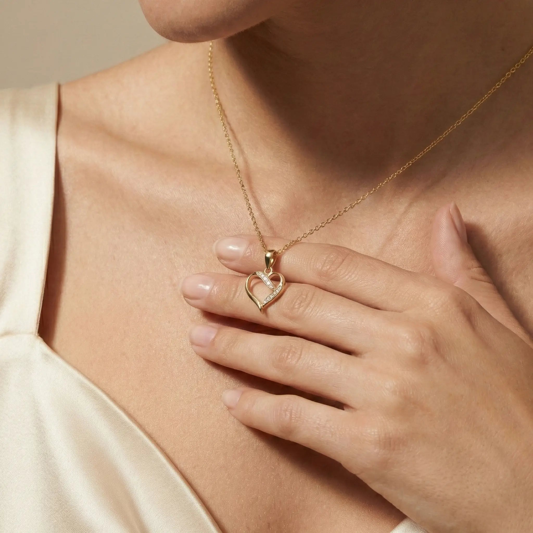 InfinityHeart – 375 Echtgold Kette mit Herz - und Unendlichkeitsmotiv - Suzan GoldHalskette