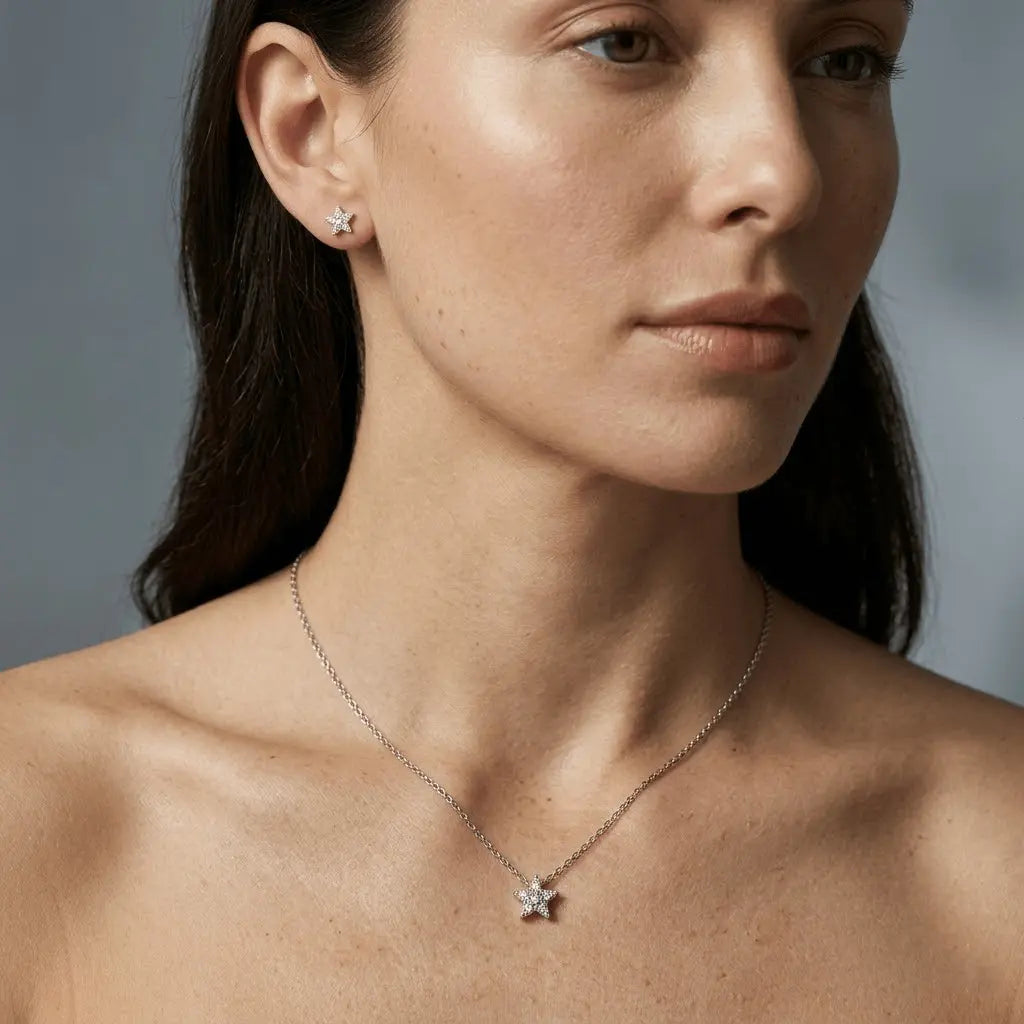 Stellara – 925 Silber Schmuckset mit funkelndem Stern - Anhänger & Ohrsteckern mit Zirkonia - Suzan Gold