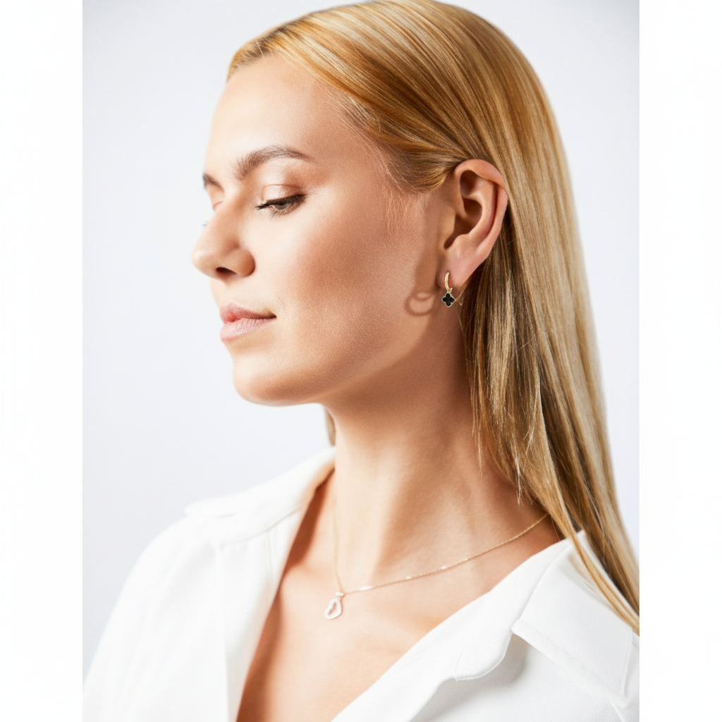 Noirleaf – 375er Echtgold-Creolen mit schwarzem Kleeblatt-Anhänger