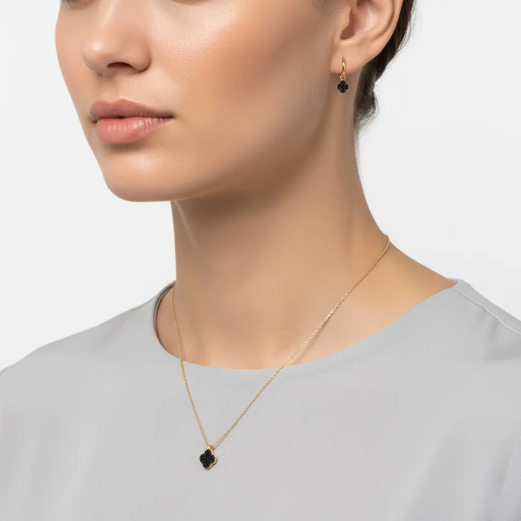 Noirclover – 375 Gold Kette & Ohrringe mit schwarzem Kleeblatt - Suzan Gold