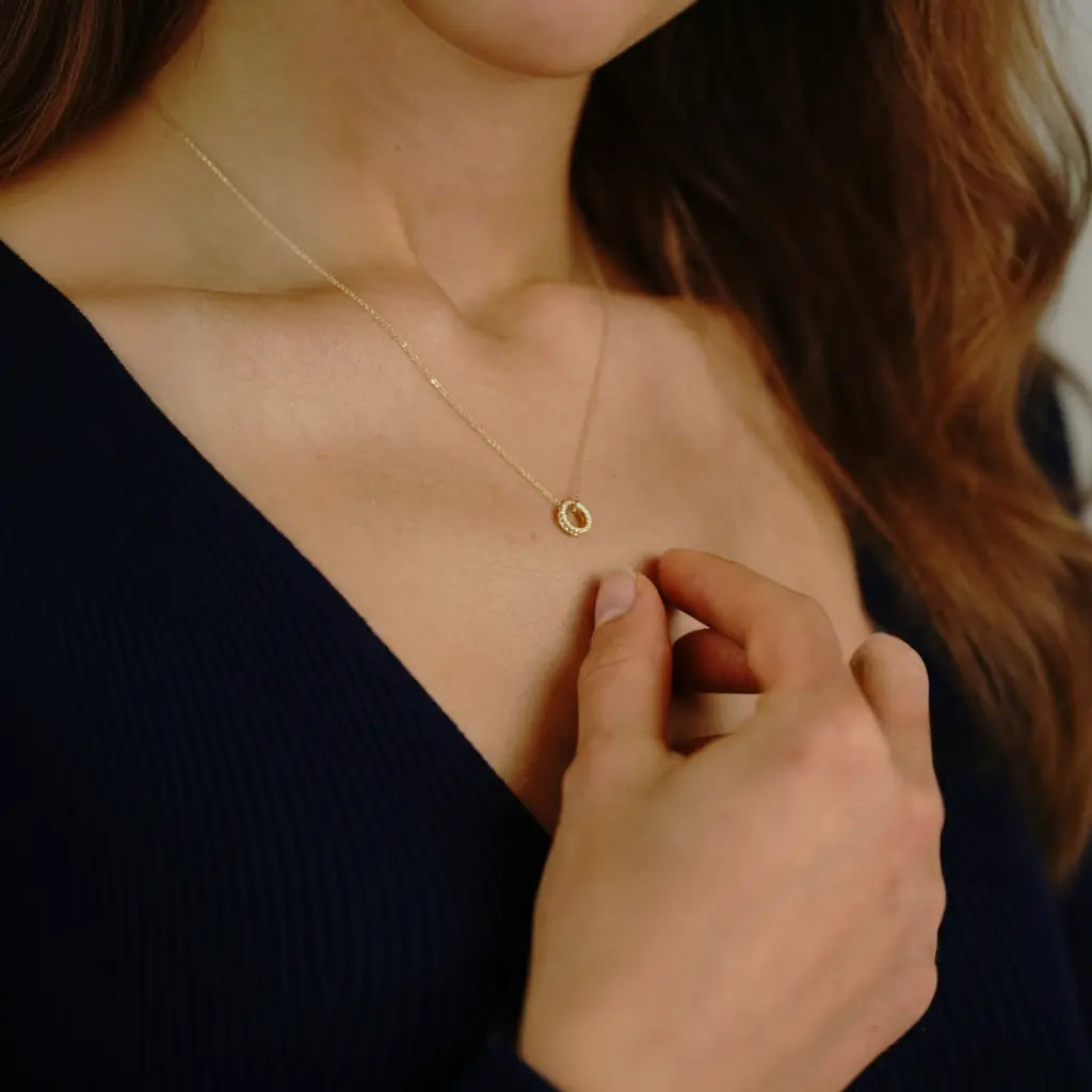 Cirquella – 375er Echtgoldkette mit Ringanhänger & Zirkonia Suzan Gold