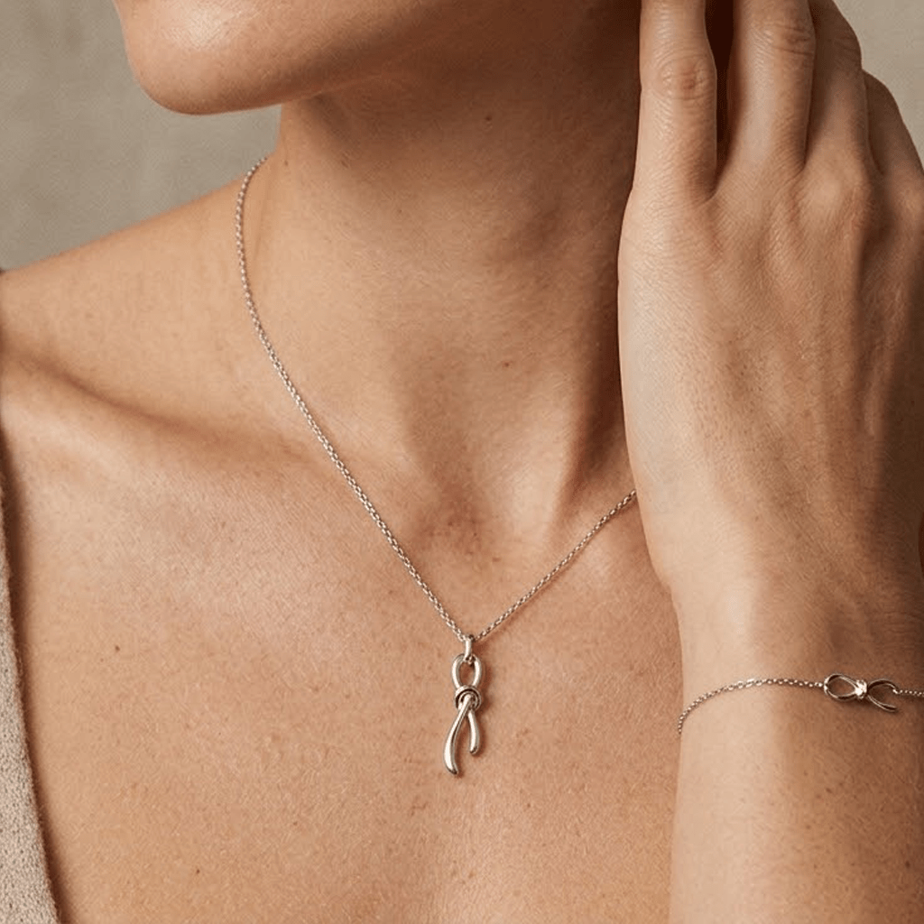 Nodessa – 925 Silber Schmuckset vergoldet mit Knoten Anhänger - Suzan Gold