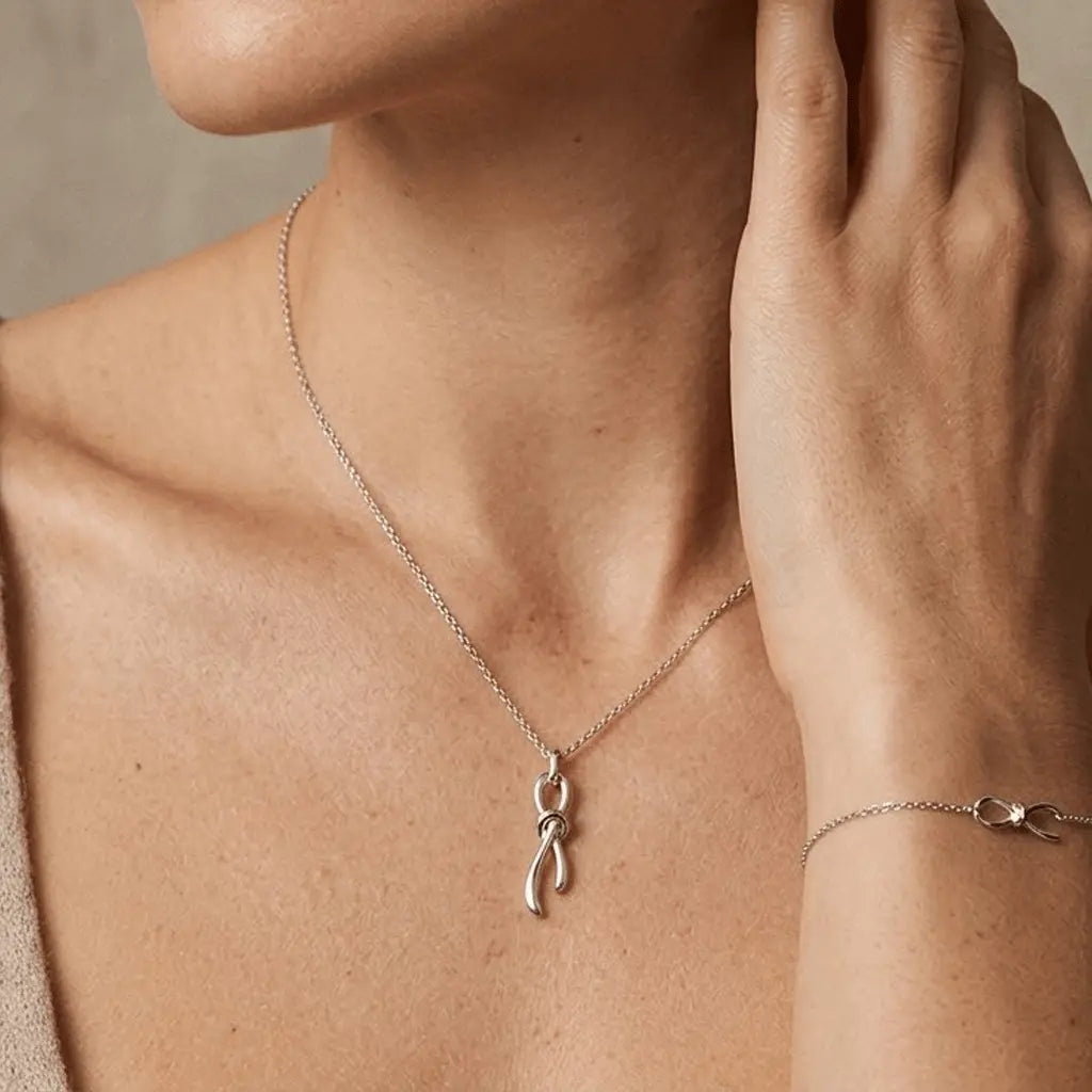 Nodessa – 925 Silber Schmuckset vergoldet mit Knoten Anhänger - Suzan Gold