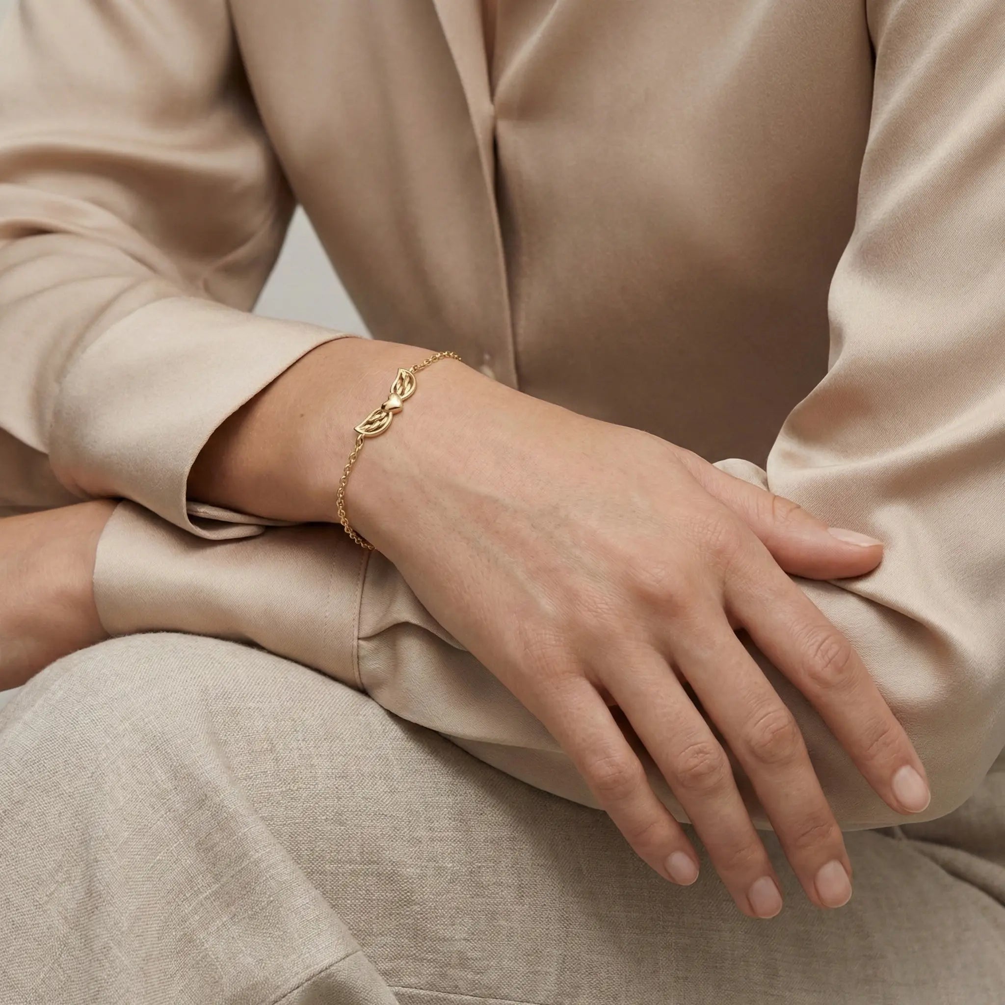 AngelHearta – 375 Echtgold Armband mit Herz und Flügeln - Suzan GoldArmbänder