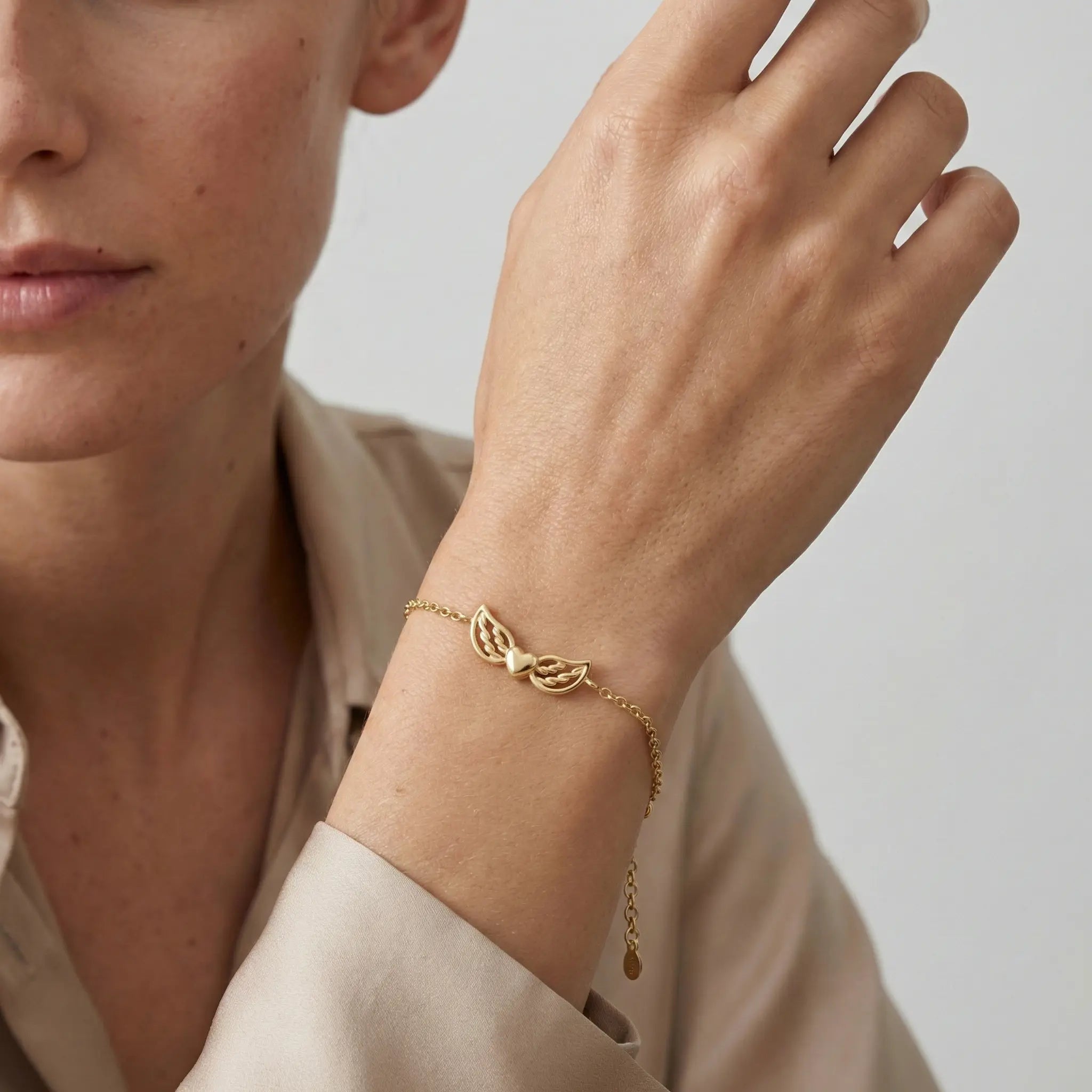 AngelHearta – 375 Echtgold Armband mit Herz und Flügeln - Suzan GoldArmbänder