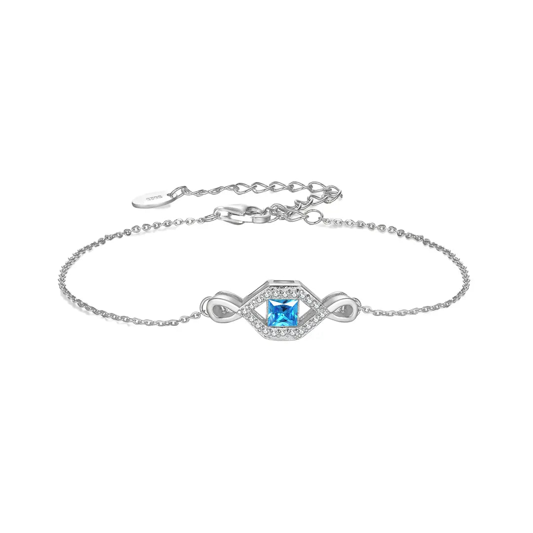 InfinityBlue Armband aus 925 Silber mit Zirkonia, filigranes Unendlichkeits-Armband mit blauem Schmuckstein für Damen, eleganter Schmuck.