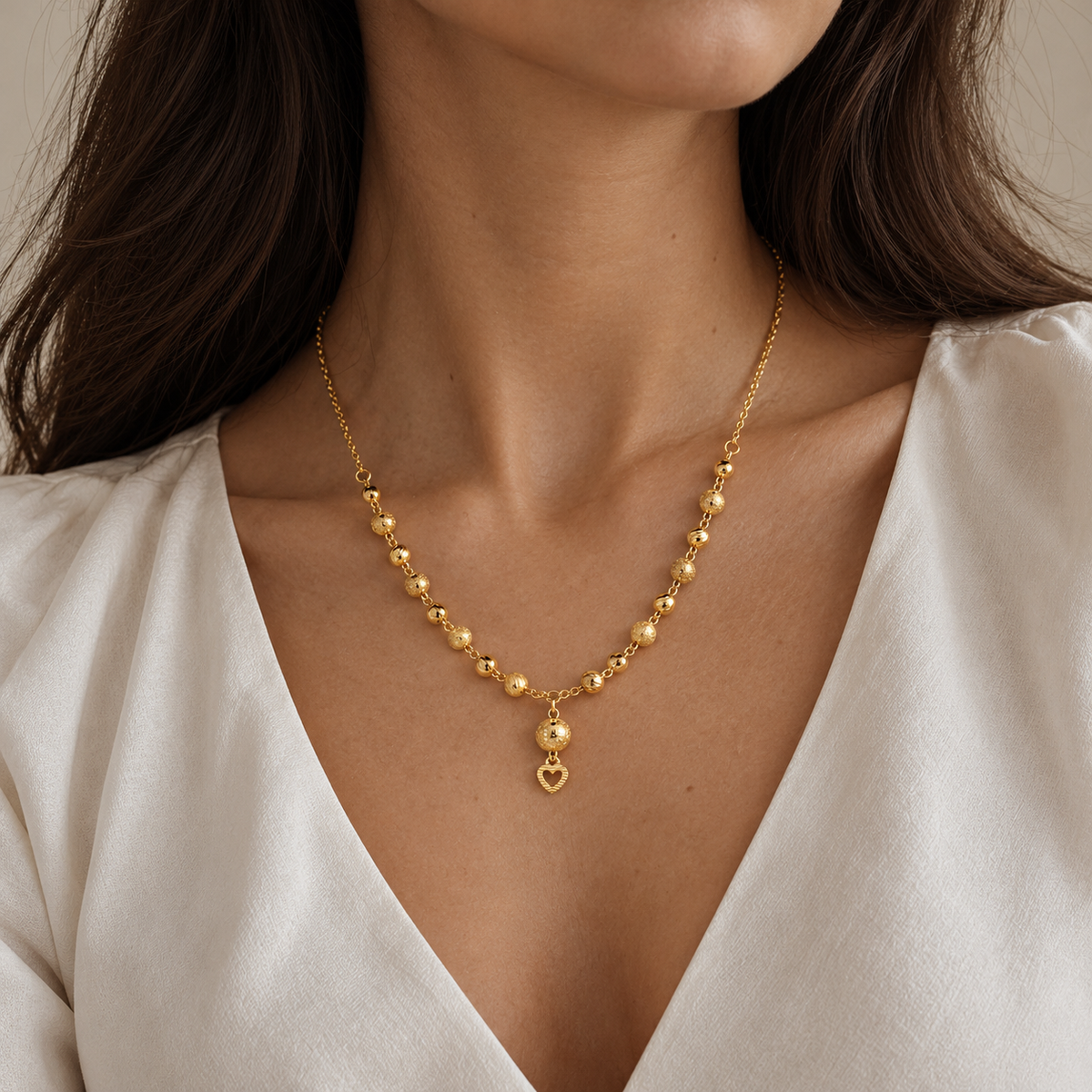 Heart Beads – Kugelkette mit Herz-Anhänger aus 875 Gold
