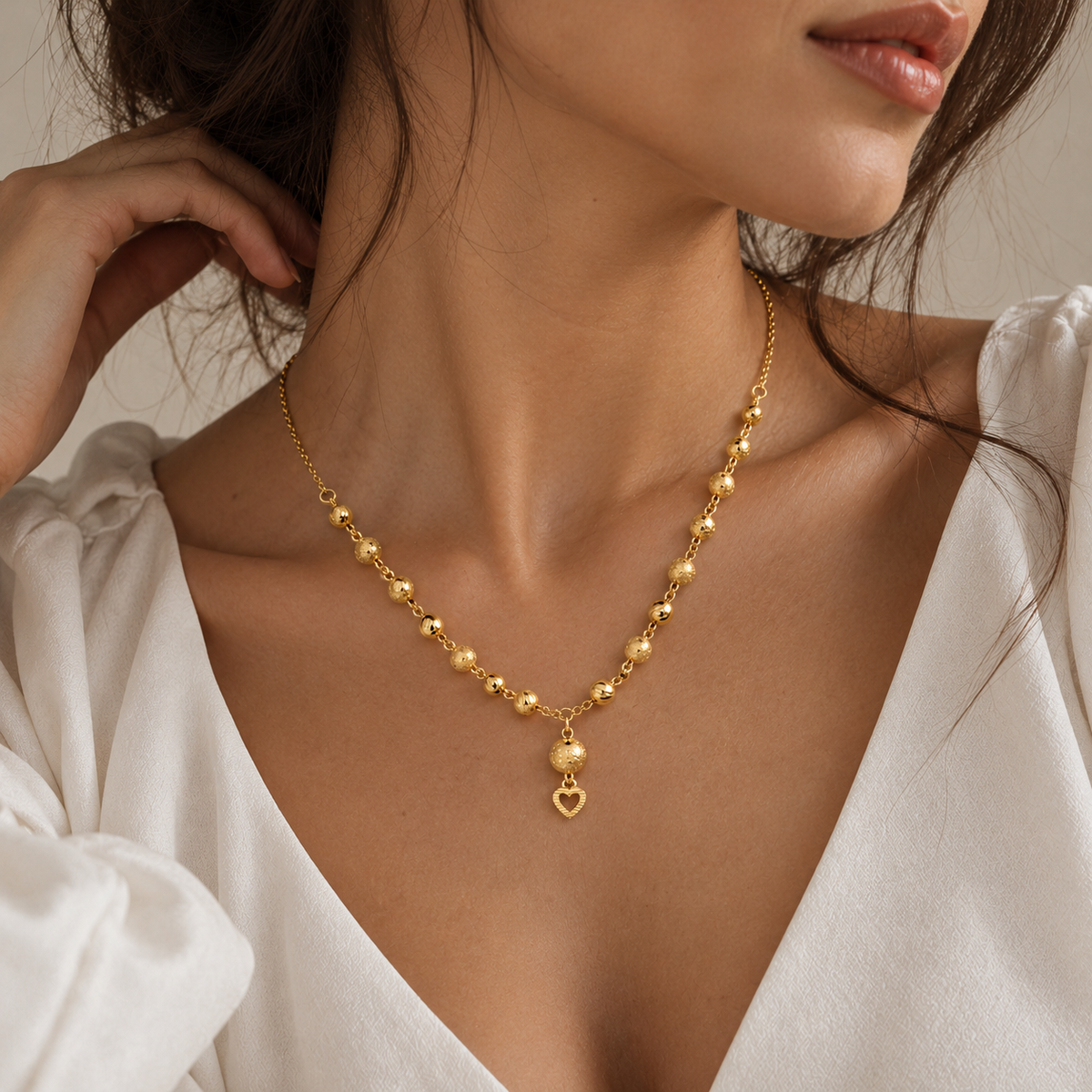 Heart Beads – Kugelkette mit Herz-Anhänger aus 875 Gold
