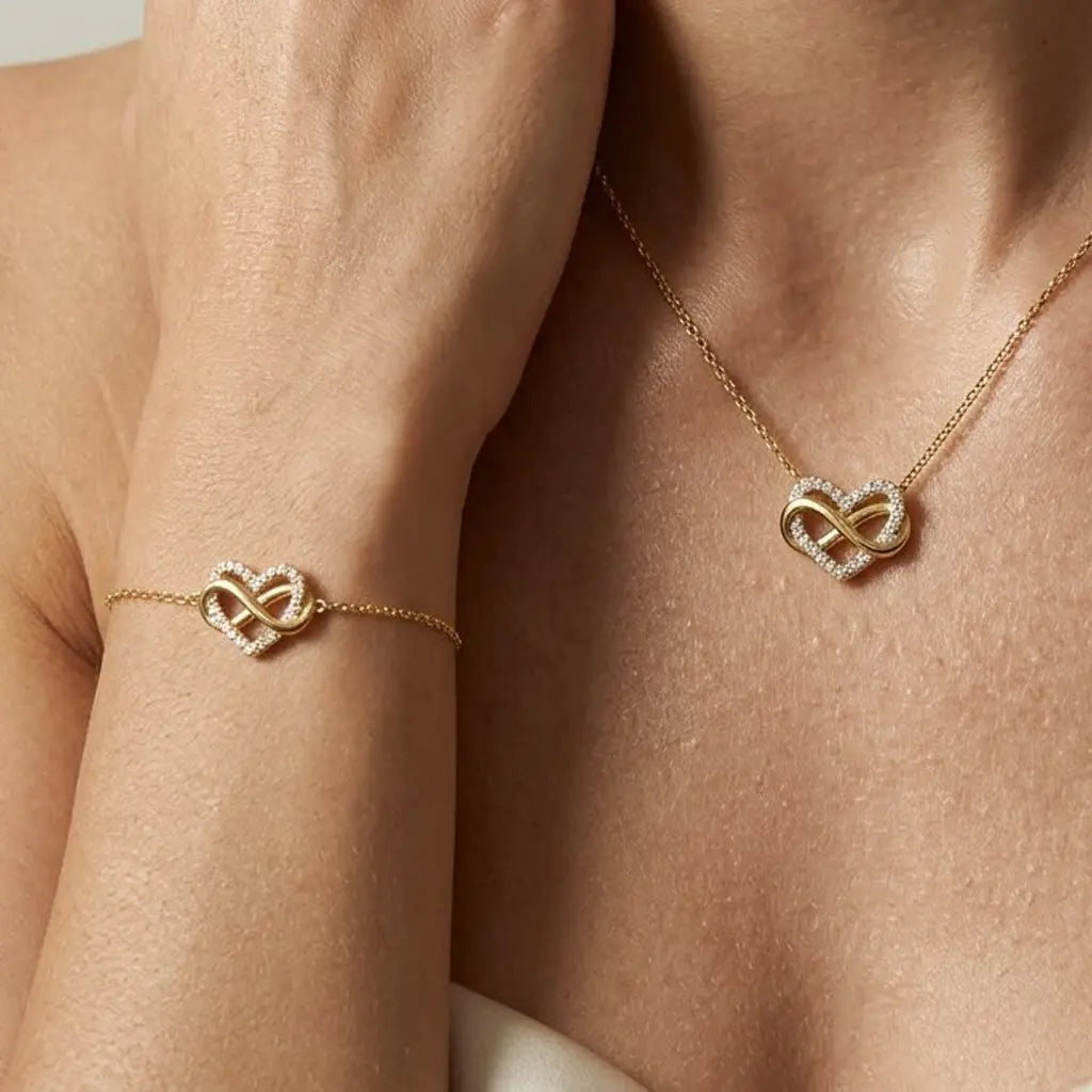 Eterna Amour – Vergoldetes 925 Silber Schmuckset mit Unendlichkeits - Herz, Halskette & Armband mit Zirkonia - Besatz - Suzan Gold