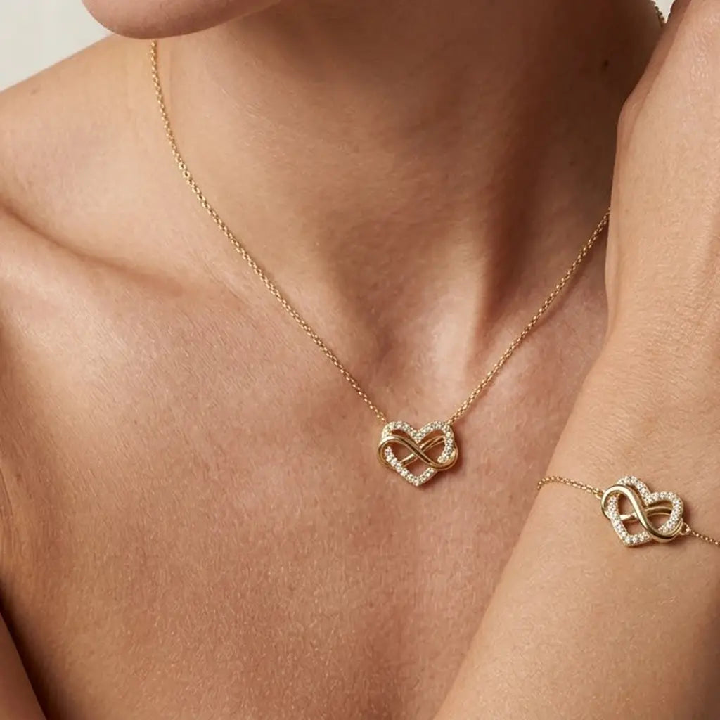 Eterna Amour – Vergoldetes 925 Silber Schmuckset mit Unendlichkeits - Herz, Halskette & Armband mit Zirkonia - Besatz - Suzan Gold