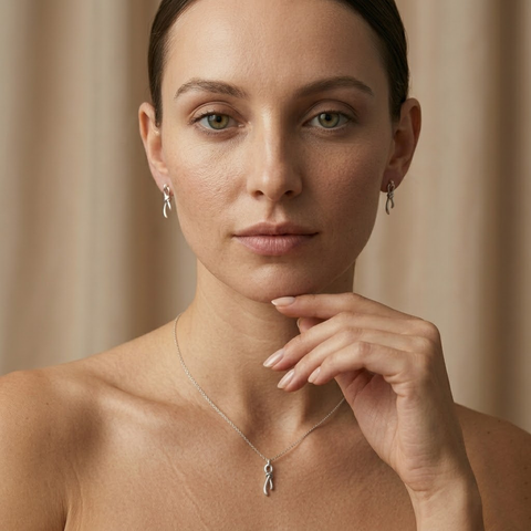 Nodessa Duo – 925 Silber Schmuckset vergoldet mit Knoten Anhänger & Ohrsteckern Suzan Gold