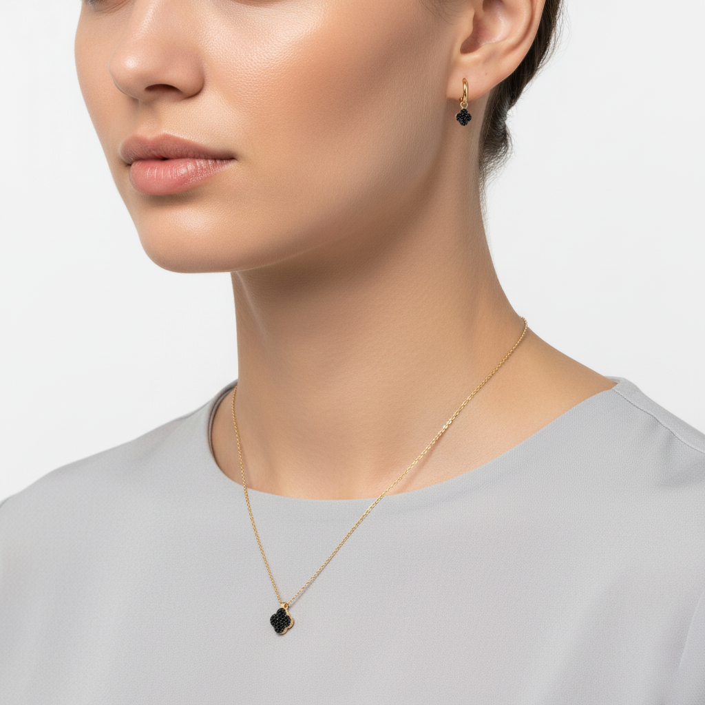 Noirclover – 375 Gold Kette & Ohrringe mit schwarzem Kleeblatt