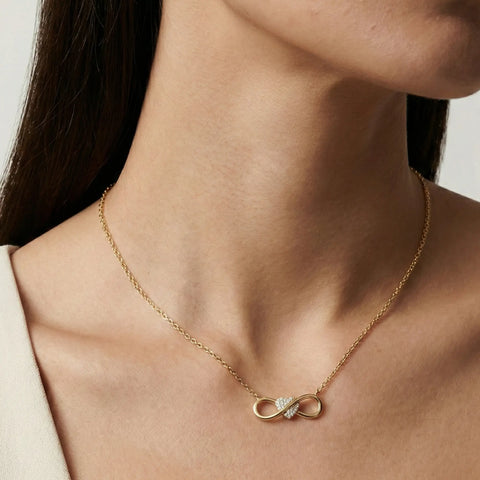 Infinity Amour – 375 Echtgold Kette mit Unendlichkeits - Herz und Zirkonia - Suzan GoldHalskette