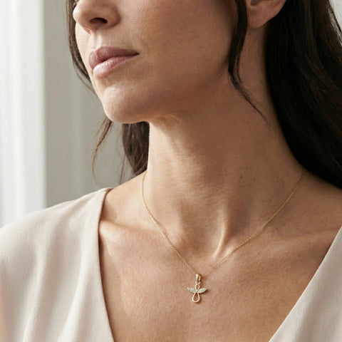 Angelica Infinity – 375 Echtgold Kette mit Engelsflügel - Unendlichkeitsanhänger - Suzan GoldHalskette