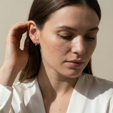 Teardrop Glow – 375 Echtgold Ohrstecker mit Zirkonia