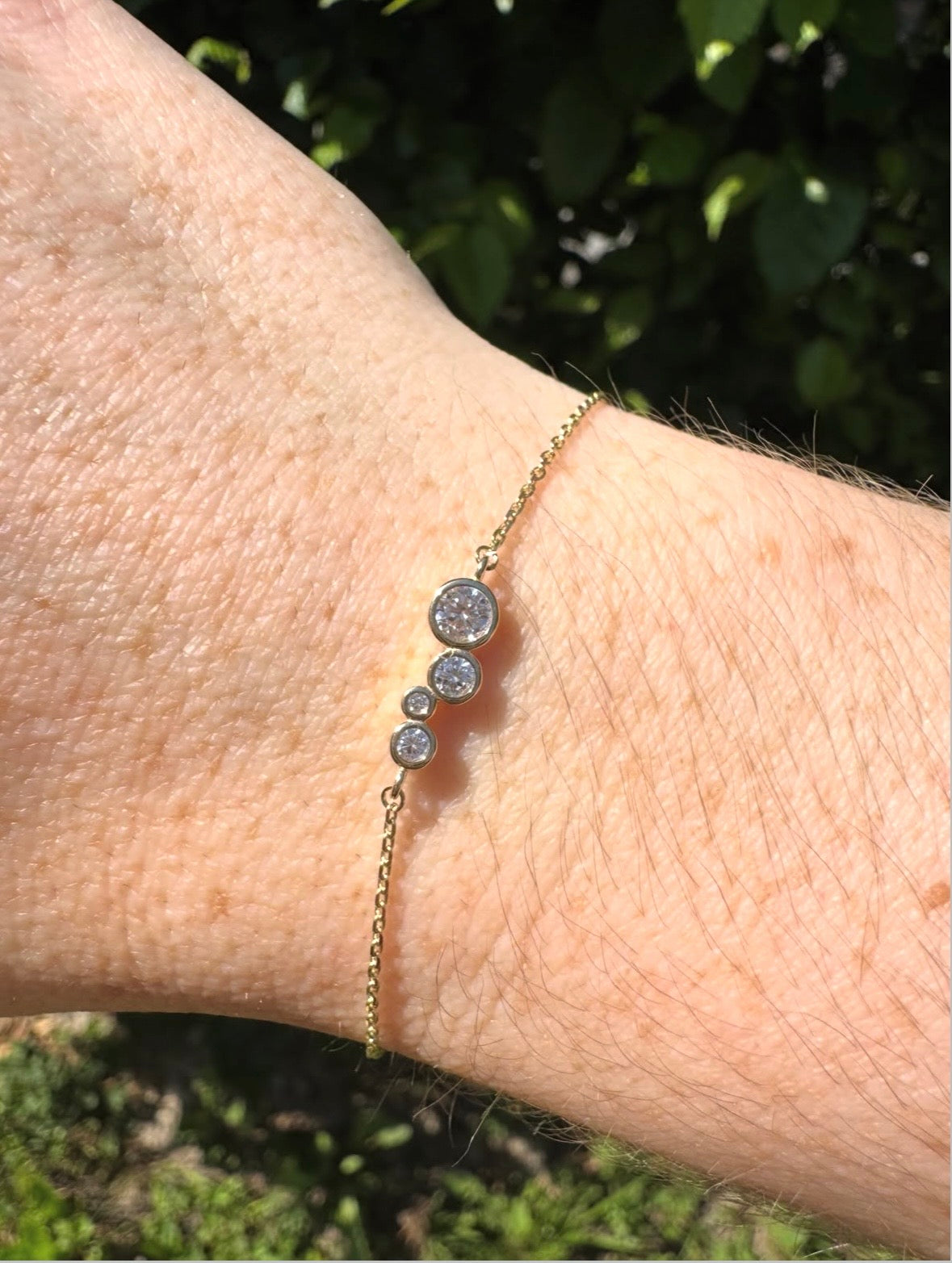 TriLume Spark – Gliederarmband aus 375 Echtgold mit asymmetrischem Zirkonia-Trio