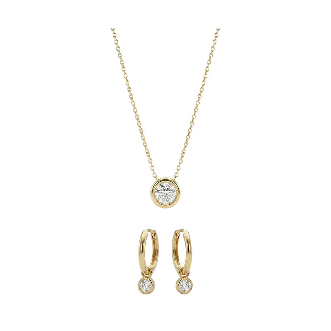Cirélia Solitär Set aus 375 Gelbgold mit Zirkonia, filigraner Schmuck für Damen, eleganter zeitloser Klassiker.