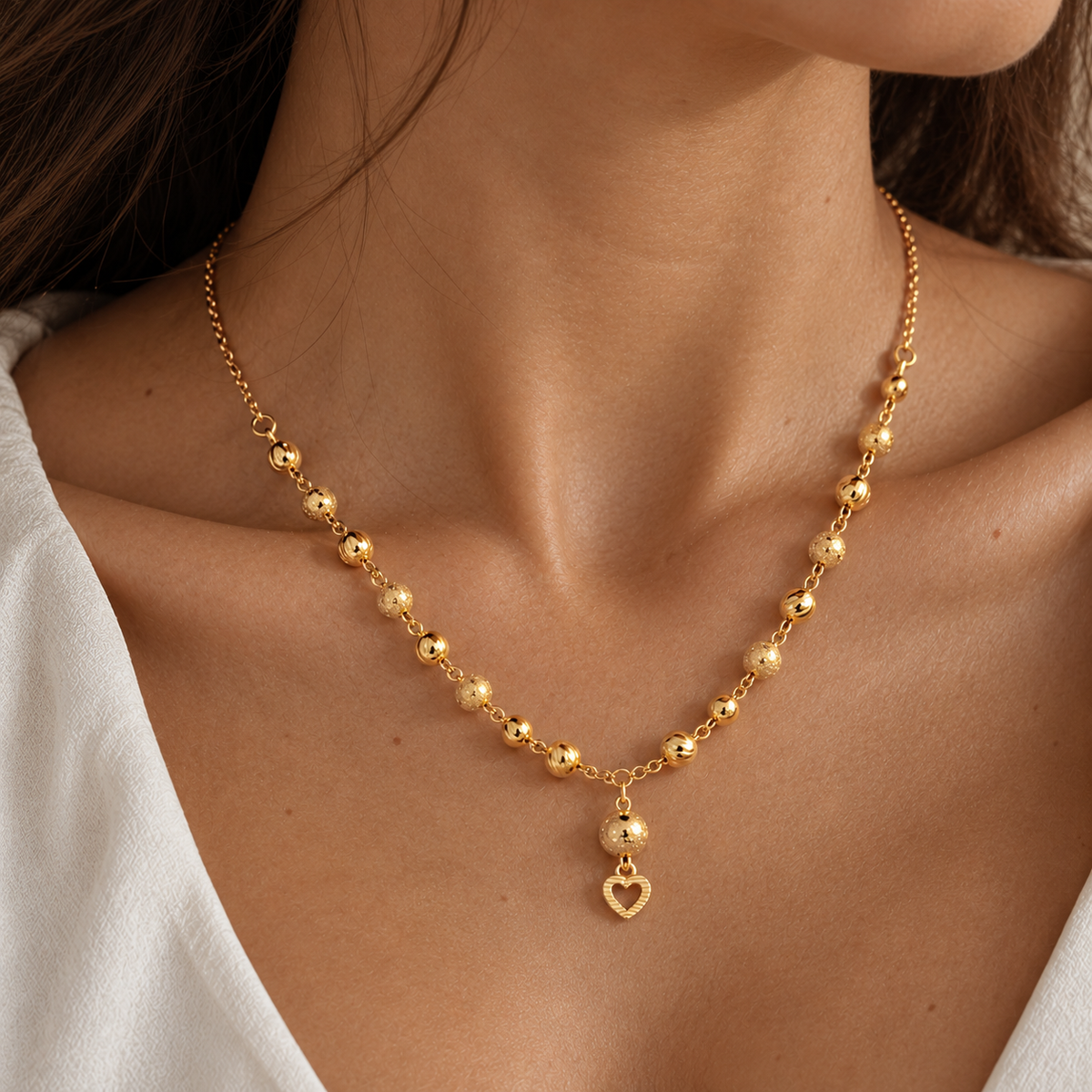 Heart Beads – Kugelkette mit Herz-Anhänger aus 875 Gold