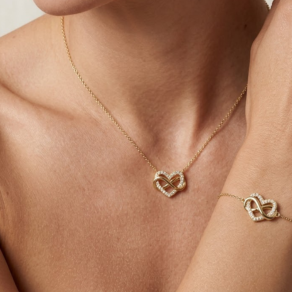 Eterna Amour – Vergoldetes 925 Silber Schmuckset mit Unendlichkeits - Herz, Halskette & Armband mit Zirkonia - Besatz - Suzan Gold